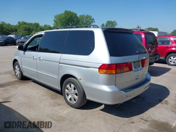 2004 Honda Odyssey EX-L with VIN 5FNRL18934B018040, listed as a IAAI auction lot 42241081 with 250,607 mi miles and . Bid and sale history available at DreamBid. Image 3.