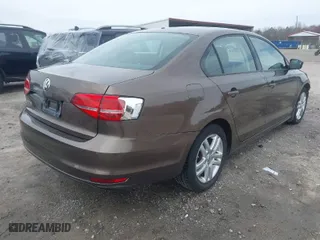 2015 Volkswagen Jetta Sedan 2.0L S with VIN 3VW2K7AJ6FM232169, listed as a IAAI auction lot 41734444 with 129,402 mi miles. Bid and sale history available at carsss.com. Image 4.