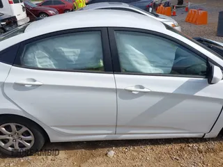 2014 Hyundai Accent GLS z VIN KMHCT4AE5EU697201, wystawiony jako IAAI lot #42157098 z przebiegiem 139 181 mil mil oraz . Historia ofert i sprzedaży dostępna na DreamBid. Obrazek 13.