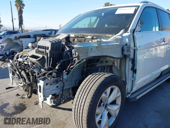 2018 Volkswagen Atlas SE с VIN 1V2DR2CA9JC551484, выставлен на аукционе IAAI как лот 41262713 с пробегом 59 054 миль миль и . История ставок и продаж доступна на DreamBid. Изображение 6.