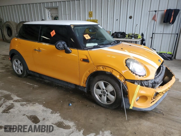 2017 MINI Hardtop Cooper with VIN WMWXP5C37H2D17030, listed as a Copart auction lot 54658275 with 144,308 mi miles and Salvage title. Bid and sale history available at DreamBid. Image 4.