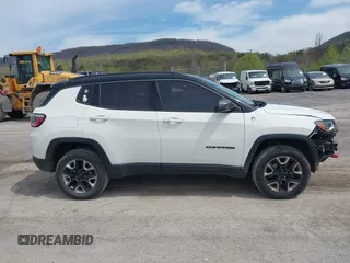 2017 Jeep Compass Trailhawk with VIN 3C4NJDDBXHT500588, listed as a IAAI auction lot 42060556 with 76,788 mi miles and . Bid and sale history available at DreamBid. Image 14.