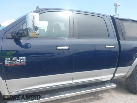 2013 Ram 2500 Laramie with VIN 3C6UR5FL1DG526345, listed as a IAAI auction lot 42328430 with 121,155 mi miles and . Bid and sale history available at DreamBid. Image 14.