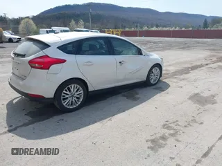 2017 Ford Focus Titanium with VIN 1FADP3N24HL331009, listed as a IAAI auction lot 42029193 with 82,068 mi miles and . Bid and sale history available at carsss.com. Image 4.