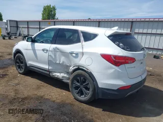 2016 Hyundai Santa Fe z VIN 5XYZTDLB9GG364375, wystawiony jako IAAI lot #42203404 z przebiegiem 143 838 mil mil oraz . Historia ofert i sprzedaży dostępna na DreamBid. Obrazek 3.