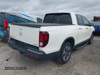2019 Honda Ridgeline RTL-E with VIN 5FPYK3F78KB018356, listed as a IAAI auction lot 41946363 with 61,472 mi miles and . Bid and sale history available at DreamBid. Image 4.