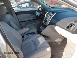 2008 Lexus RX with VIN 2T2HK31U08C053634, listed as a IAAI auction lot 42061737 with 306,854 mi miles. Bid and sale history available at carsss.com. Image 5.