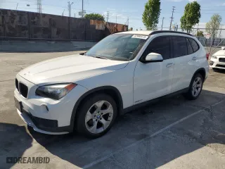 2015 BMW X1 sDrive28i with VIN WBAVM1C52FVZ94327, listed as a Copart auction lot 52998975 with 110,515 mi miles and Salvage Title. Bid and sale history available at carsss.com. Image 1.