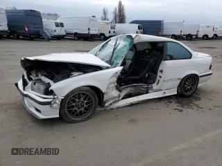 1999 BMW 3 Series M3 with VIN WBSBG9332XEY80431, listed as a Copart auction lot 86556974 with 0 mi miles and Salvage Title. Bid and sale history available at carsss.com. Image 1.