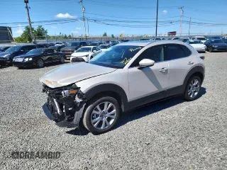 2023 Mazda CX-30 S Premium with VIN 3MVDMBDM1PM568102, listed as a Copart auction lot 57861665 with 7,017 mi miles and Salvage title. Bid and sale history available at DreamBid. Image 1.