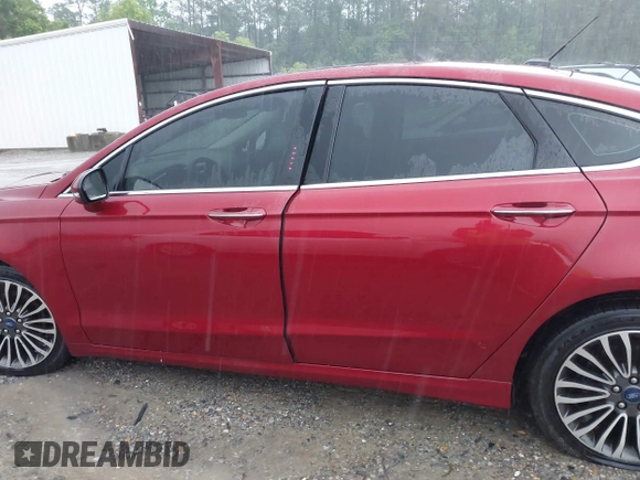 2018 Ford Fusion Titanium with VIN 3FA6P0D91JR233679, listed as a IAAI auction lot 42182140 with 100,706 mi miles and . Bid and sale history available at DreamBid. Image 14.