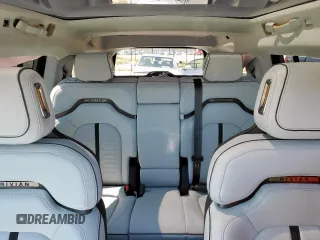 2023 Rivian R1S Launch Edition z VIN 7PDSGABL9PN010792, wystawiony jako Copart lot #56359465 z przebiegiem 24 319 mil mil oraz Szkoda całkowita • Salvage title. Historia ofert i sprzedaży dostępna na DreamBid. Obrazek 10.