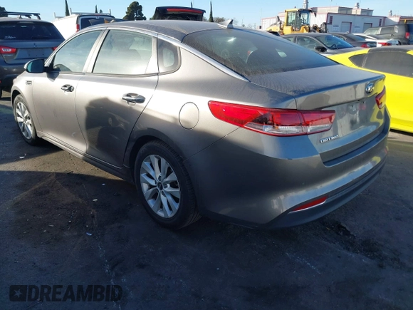 2018 Kia Optima LX with VIN 5XXGT4L32JG256921, listed as a IAAI auction lot 41389850 with 91,013 mi miles and . Bid and sale history available at DreamBid. Image 3.