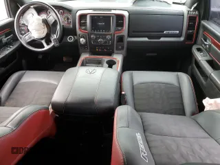 2018 Ram 1500 Rebel with VIN 1C6RR7YT7JS235965, listed as a Copart auction lot 84749674 with 61,484 mi miles and Salvage title. Bid and sale history available at DreamBid. Image 8.