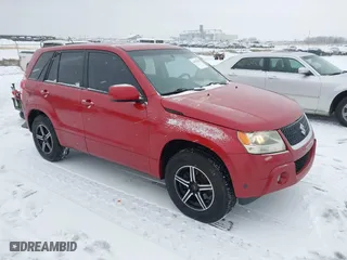 2012 Suzuki Grand Vitara Premium with VIN JS3TD0D23C4101867, listed as a IAAI auction lot 41278706 with 171,984 mi miles. Bid and sale history available at carsss.com. Image 1.