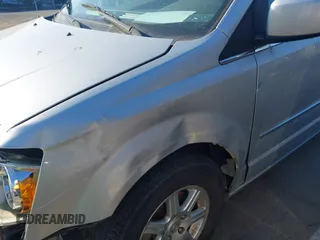 2010 Chrysler Town & Country Touring with VIN 2A4RR5D19AR202169, listed as a IAAI auction lot 42123581 with 183,000 mi miles and . Bid and sale history available at DreamBid. Image 13.