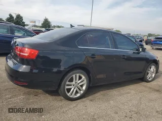 2015 Volkswagen Jetta SEL z VIN 3VWL17AJ2FM281957, wystawiony jako Copart lot #65836185 z przebiegiem 82 478 mil mil oraz Czysty tytuł • Clean title. Historia ofert i sprzedaży dostępna na DreamBid. Obrazek 3.