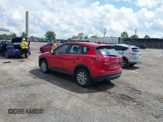 2015 Mazda CX-5 Sport with VIN JM3KE4BY5F0502121, listed as a IAAI auction lot 42652276 with 192,462 mi miles and . Bid and sale history available at DreamBid. Image 3.