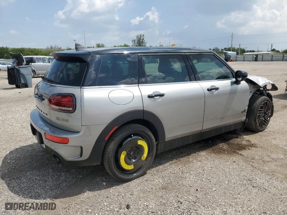 2024 MINI Clubman Cooper S with VIN WMWXJ1C01R2V12216, listed as a Copart auction lot 68257044 with 7,339 mi miles and Salvage Title. Bid and sale history available at carsss.com. Image 3.