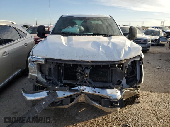 2020 Ford F-250 XL with VIN 1FT7W2A64LEC12385, listed as a Copart auction lot 77958334 with 122,635 mi miles and Salvage title. Bid and sale history available at DreamBid. Image 5.