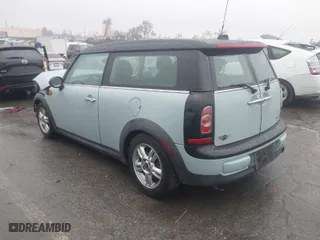 2013 MINI Cooper Clubman with VIN WMWZF3C56DT491108, listed as a IAAI auction lot 41734006 with 100,086 mi miles. Bid and sale history available at carsss.com. Image 3.