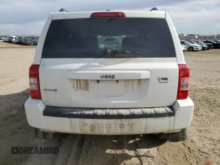 2010 Jeep Patriot Sport with VIN 1J4NF2GB2AD525475, listed as a Copart auction lot 51986785 with 90,659 mi miles and Salvage Title. Bid and sale history available at carsss.com. Image 6.