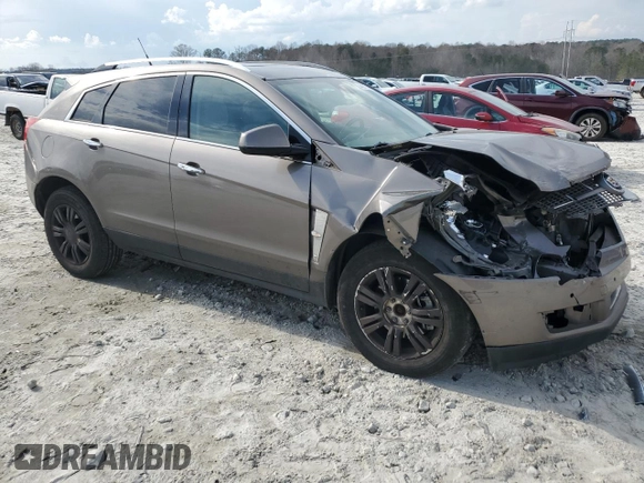 2011 Cadillac SRX Luxury Collection with VIN 3GYFNAEYXBS551980, listed as a Copart auction lot 48872345 with 198,707 mi miles and Salvage Title. Bid and sale history available at carsss.com. Image 4.