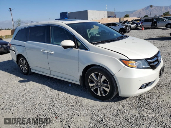 2016 Honda Odyssey Touring Elite with VIN 5FNRL5H9XGB006981, listed as a Copart auction lot 63970385 with 165,164 mi miles and Salvage title. Bid and sale history available at DreamBid. Image 4.