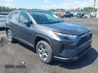 2023 Toyota RAV4 Hybrid XLE with VIN JTMRWRFV0PD180581, listed as a IAAI auction lot 42707118 with 13,823 mi miles and . Bid and sale history available at DreamBid. Image 1.
