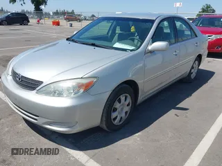 2004 Toyota Camry LE with VIN 4T1BE32K74U300025, listed as a IAAI auction lot 42035954 with 115,203 mi miles. Bid and sale history available at carsss.com. Image 17.