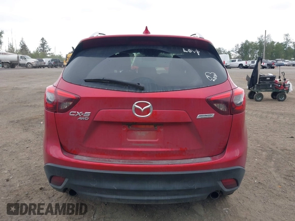 2016 Mazda CX-5 Grand Touring z VIN JM3KE4DY7G0687318, wystawiony jako IAAI lot #42228585 z przebiegiem 188 793 mil mil oraz . Historia ofert i sprzedaży dostępna na DreamBid. Obrazek 16.