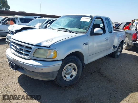 2002 Ford F-150 XL with VIN 1FTRX07242KA59876, listed as a IAAI auction lot 42673613 with 85,536 mi miles and . Bid and sale history available at DreamBid. Image 2.