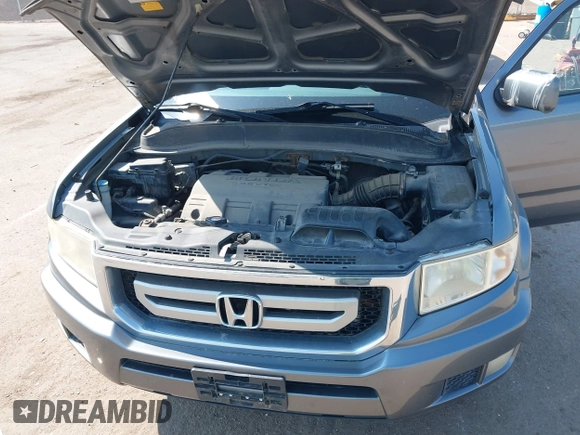 2009 Honda Ridgeline RTS z VIN 5FPYK16479B107114, wystawiony jako IAAI lot #42452199 z przebiegiem 206 853 mil mil oraz . Historia ofert i sprzedaży dostępna na DreamBid. Obrazek 10.