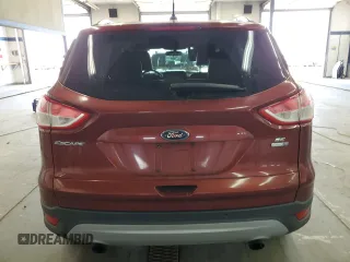 2014 Ford Escape SE with VIN 1FMCU9GX7EUB64656, listed as a Copart auction lot 54170125 with 114,116 mi miles and Salvage Title. Bid and sale history available at carsss.com. Image 6.