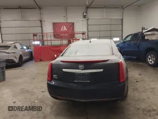 2013 Cadillac XTS Luxury with VIN 2G61P5S34D9200849, listed as a IAAI auction lot 41412189 with 134,932 mi miles. Bid and sale history available at carsss.com. Image 16.