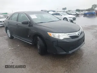 2014 Toyota Camry L with VIN 4T1BF1FK0EU823710, listed as a IAAI auction lot 42153523 with 105,468 mi miles and . Bid and sale history available at DreamBid. Image 1.