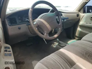 1997 Toyota T100 SR5 z VIN JT4UN24D4V0037751, wystawiony jako Copart lot #58940575 z przebiegiem 225 109 mil mil oraz Czysty tytuł • Clean title. Historia ofert i sprzedaży dostępna na DreamBid. Obrazek 8.