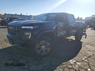2024 GMC Canyon 4WD AT4 with VIN 1GTP6DEK5R1154046, listed as a Copart auction lot 82798064 with 0 mi miles and Salvage Title. Bid and sale history available at carsss.com. Image 1.