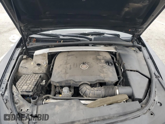 2013 Cadillac CTS Premium с VIN 1G6DP5E38D0107402, выставлен на аукционе Copart как лот 53307855 с пробегом 125 639 миль миль и Списание • Salvage title. История ставок и продаж доступна на DreamBid. Изображение 11.