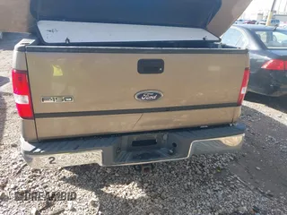 2004 Ford F-150 XL with VIN 1FTRF12W94NA93705, listed as a IAAI auction lot 41965446 with 209,097 mi miles. Bid and sale history available at carsss.com. Image 17.