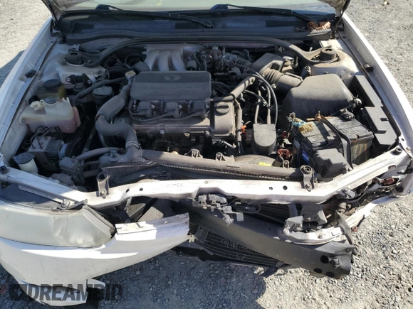 2002 Toyota Solara SE z VIN 2T1FF28P22C595397, wystawiony jako Copart lot #58276695 z przebiegiem Nie podano mil oraz Szkoda całkowita • Salvage title. Historia ofert i sprzedaży dostępna na DreamBid. Obrazek 11.