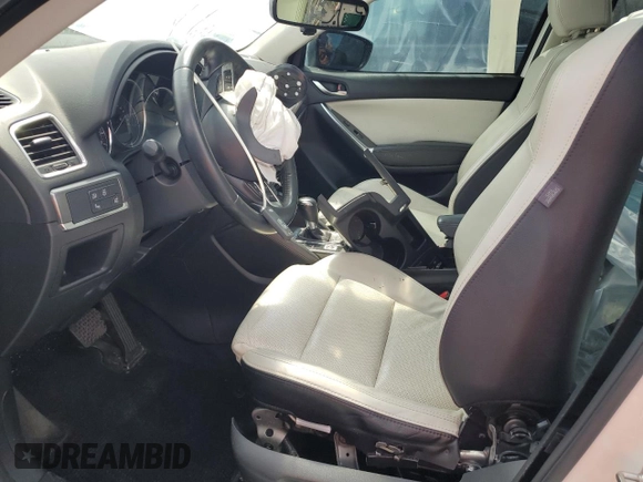2016 Mazda CX-5 Grand Touring with VIN JM3KE4DY4G0669259, listed as a Copart auction lot 50470145 with 0 mi miles and Non Repairable. Bid and sale history available at carsss.com. Image 7.