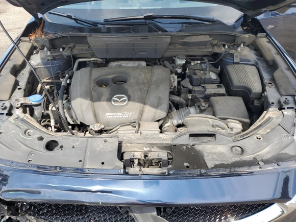 2018 Mazda CX-5 Grand Touring with VIN JM3KFADM3J1312519, listed as a Copart auction lot 56276685 with 109,486 mi miles and Clean title. Bid and sale history available at DreamBid. Image 12.