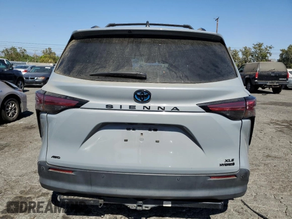 2022 Toyota Sienna XLE Woodland Edition with VIN 5TDASKFC1NS057260, listed as a Copart auction lot 67475584 with 59,396 mi miles and Salvage Title. Bid and sale history available at carsss.com. Image 6.