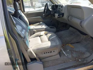 1999 GMC Suburban with VIN 3GKFK16R4XG514928, listed as a IAAI auction lot 41934636 with 245,010 mi miles and . Bid and sale history available at DreamBid. Image 5.
