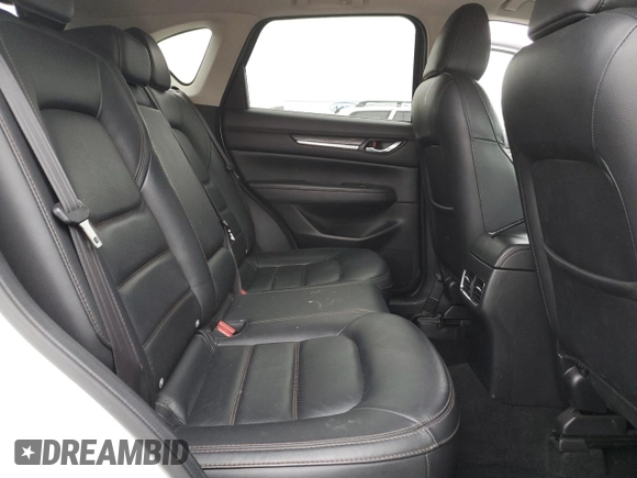2021 Mazda CX-5 Grand Touring with VIN JM3KFBDM4M1344602, listed as a Copart auction lot 82793724 with 69,322 mi miles and Salvage Title. Bid and sale history available at carsss.com. Image 11.