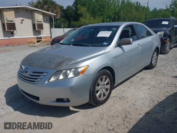 2007 Toyota Camry LE with VIN 4T1BK46KX7U030995, listed as a IAAI auction lot 42170932 with 191,002 mi miles and . Bid and sale history available at DreamBid. Image 2.