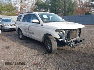 2022 Ford Expedition XLT with VIN 1FMJU1JT1NEA27995, listed as a IAAI auction lot 40935076 with 154,139 mi miles. Bid and sale history available at carsss.com. Image 1.