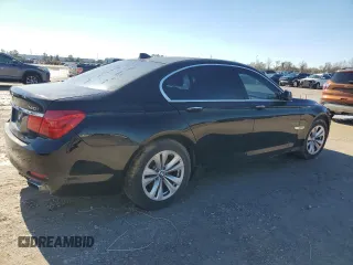 2012 BMW 7 Series 740i with VIN WBAKA4C52CDS99036, listed as a Copart auction lot 88492615 with Not provided miles and Salvage title. Bid and sale history available at DreamBid. Image 3.