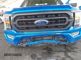 2021 Ford F-150 XL with VIN 1FTFW1CD0MFC50953, listed as a IAAI auction lot 41466036 with 33,983 mi miles and . Bid and sale history available at DreamBid. Image 6.